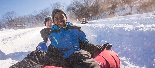 Family snow tubing at Cascare Mountain Wisconsin Dells