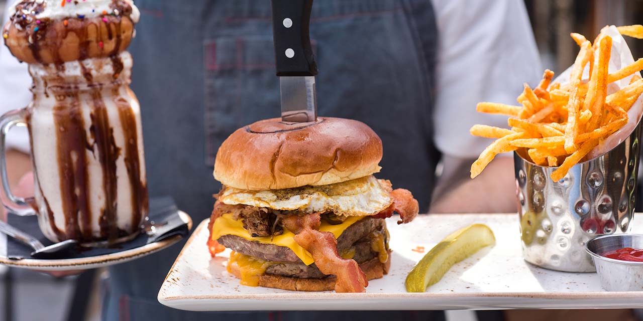 Burger with fries and milkshake at B-Lux Grill & Bar
