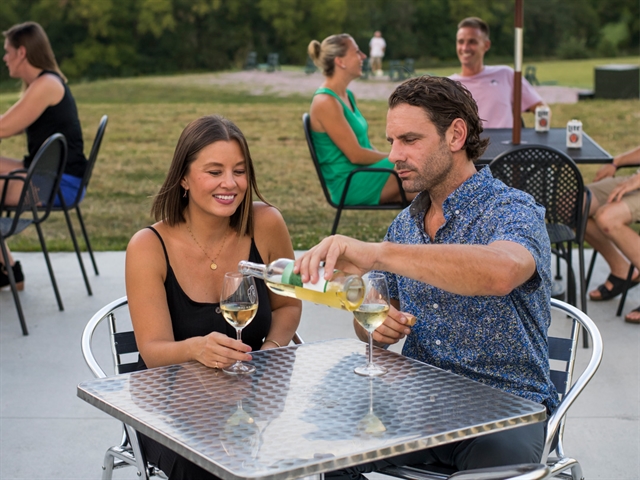 A couple enjoying wine at Balanced Rock Winery.