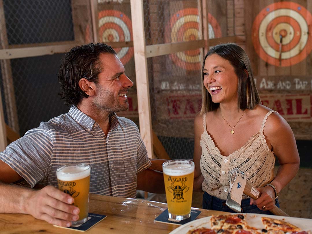 A couple at Asgard Axe & Tap in Wisconsin Dells.