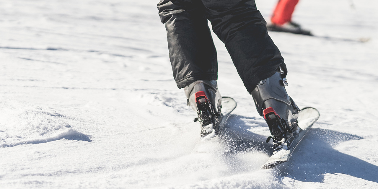 A skier stopping.