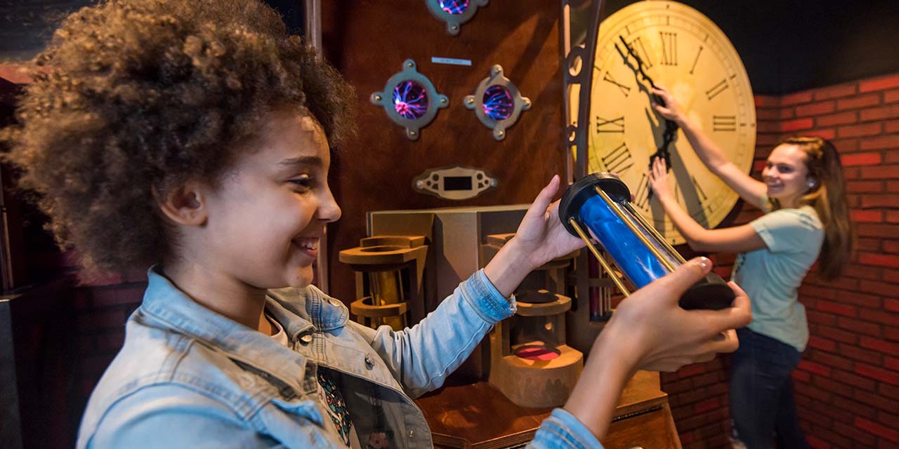 Girls playing at Booby Trap Escape Room