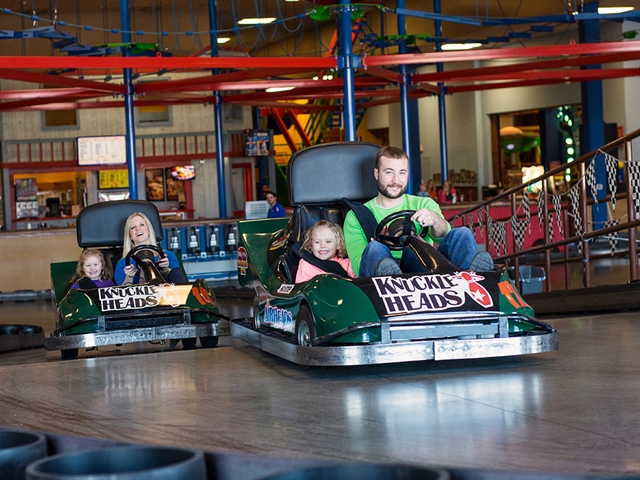 Family riding go-karts at Knuckleheads.
