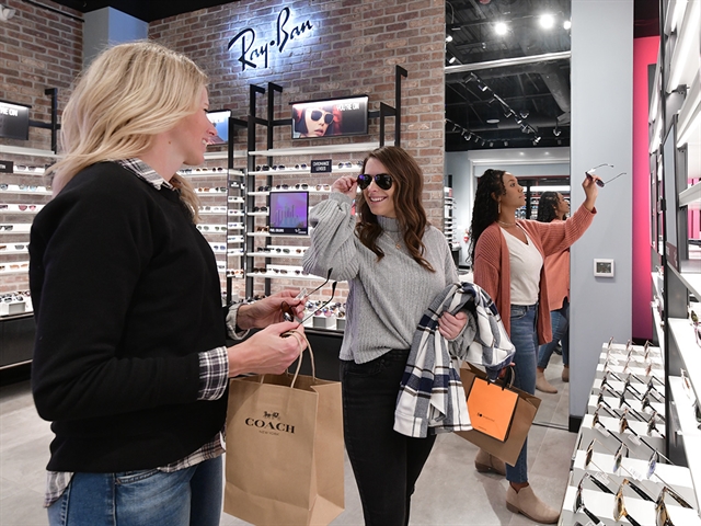 Friends shopping at Outlets at the Dells.