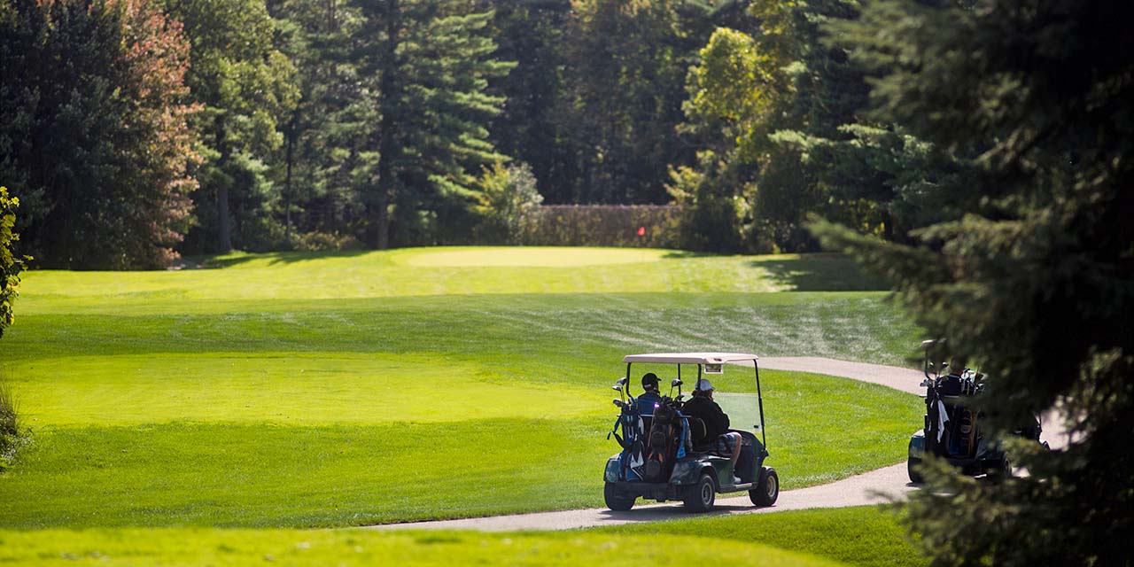 Golfers playing at Coldwater Canyon Golf Course