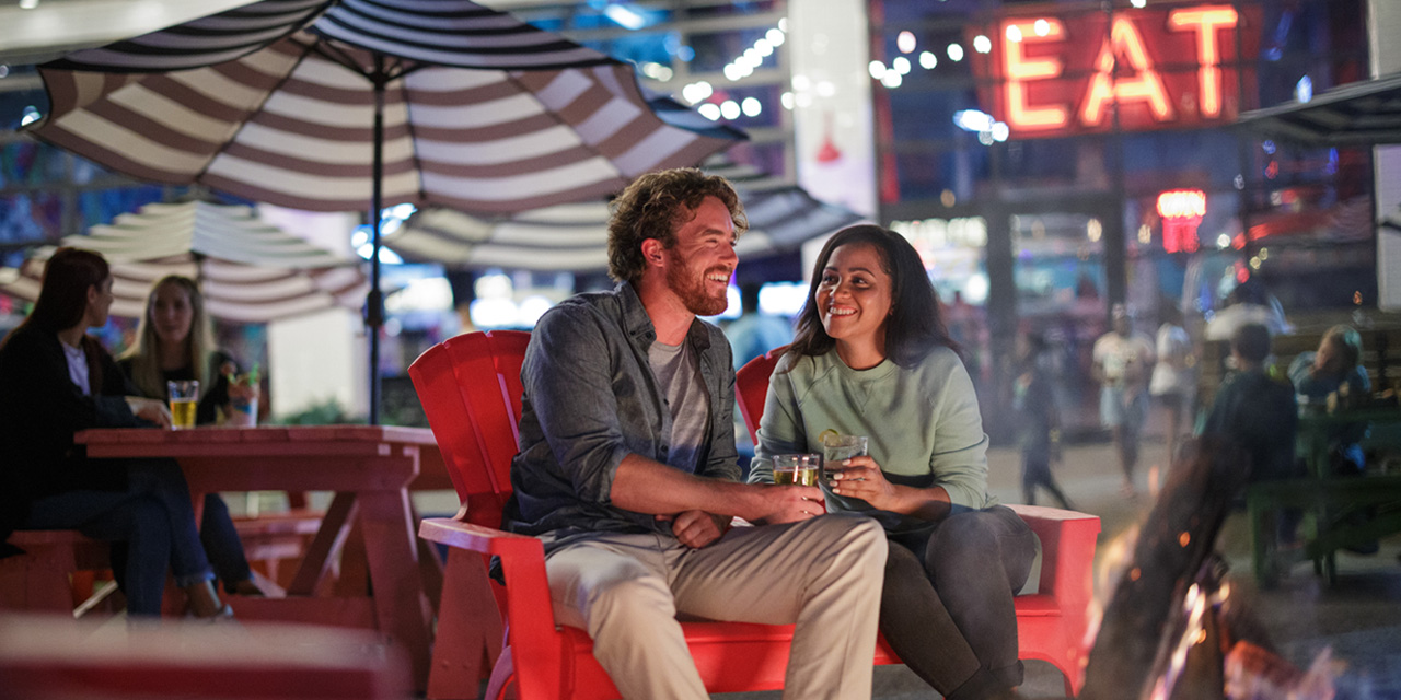 A Couple by the fire at Grateful Shed