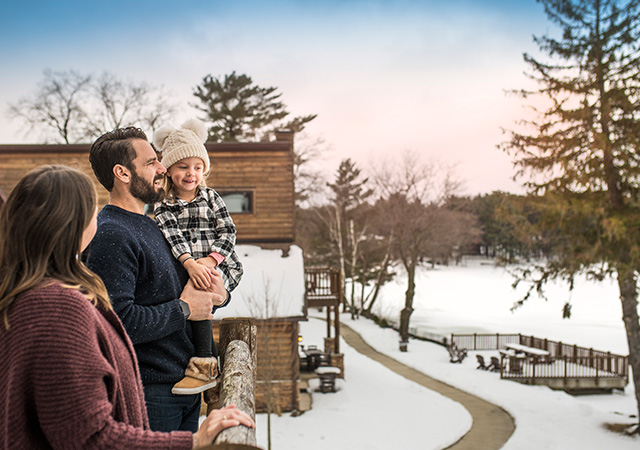 Family enjoying the view at Lake Delton Waterfront Villas.