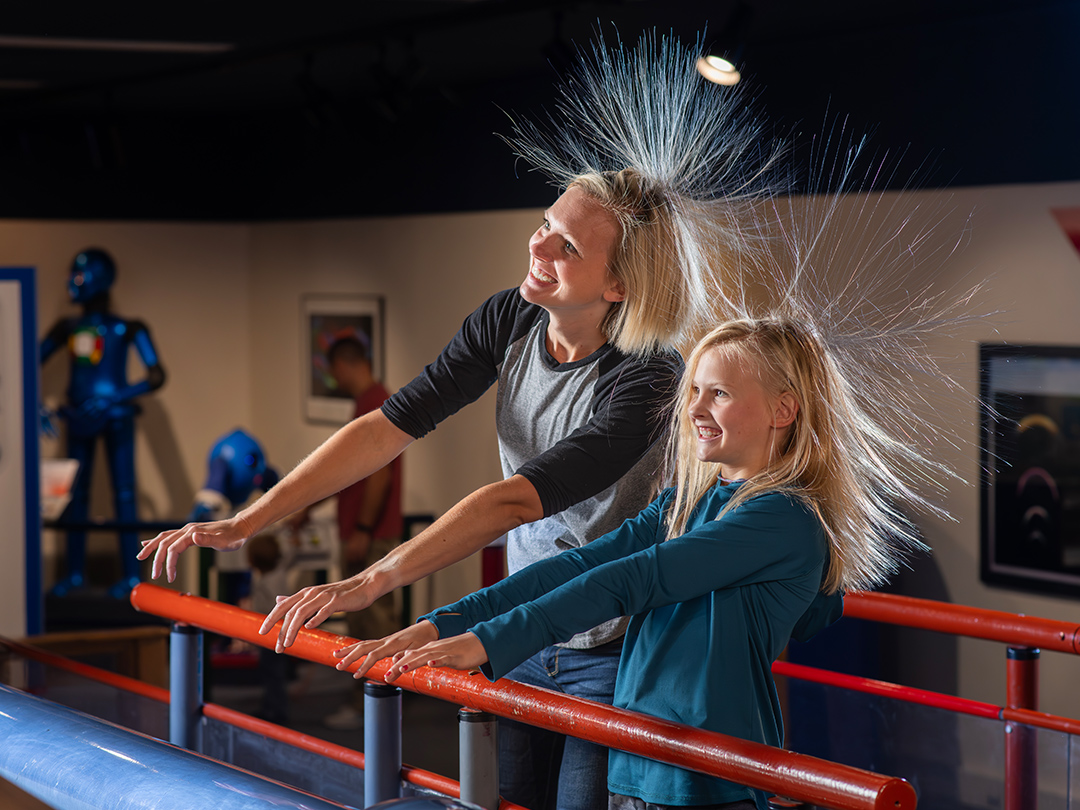 Mom and daughter having fun at Tommy Bartlett Exploratory.