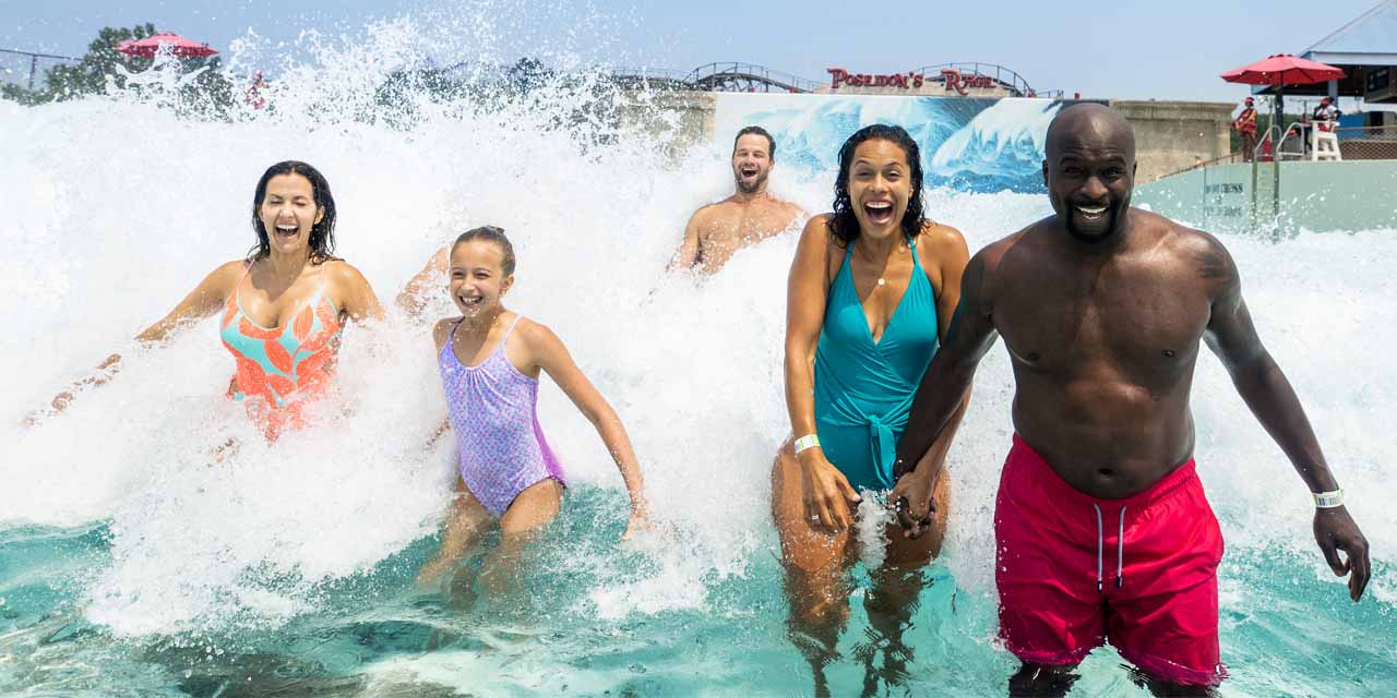 A family in the Mt. Olympus Water & Theme Park wave pool.