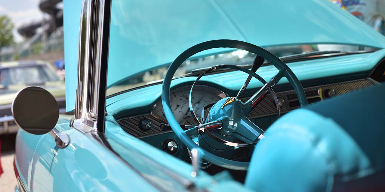 Old light blue car at Automotion car show
