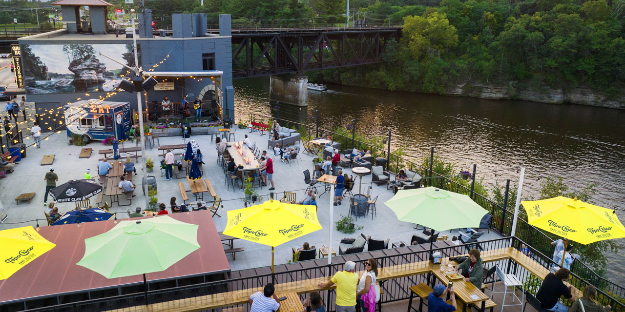 Outdoor dining along the Wisconsin River at The DIstrict in Wisconsin Dells