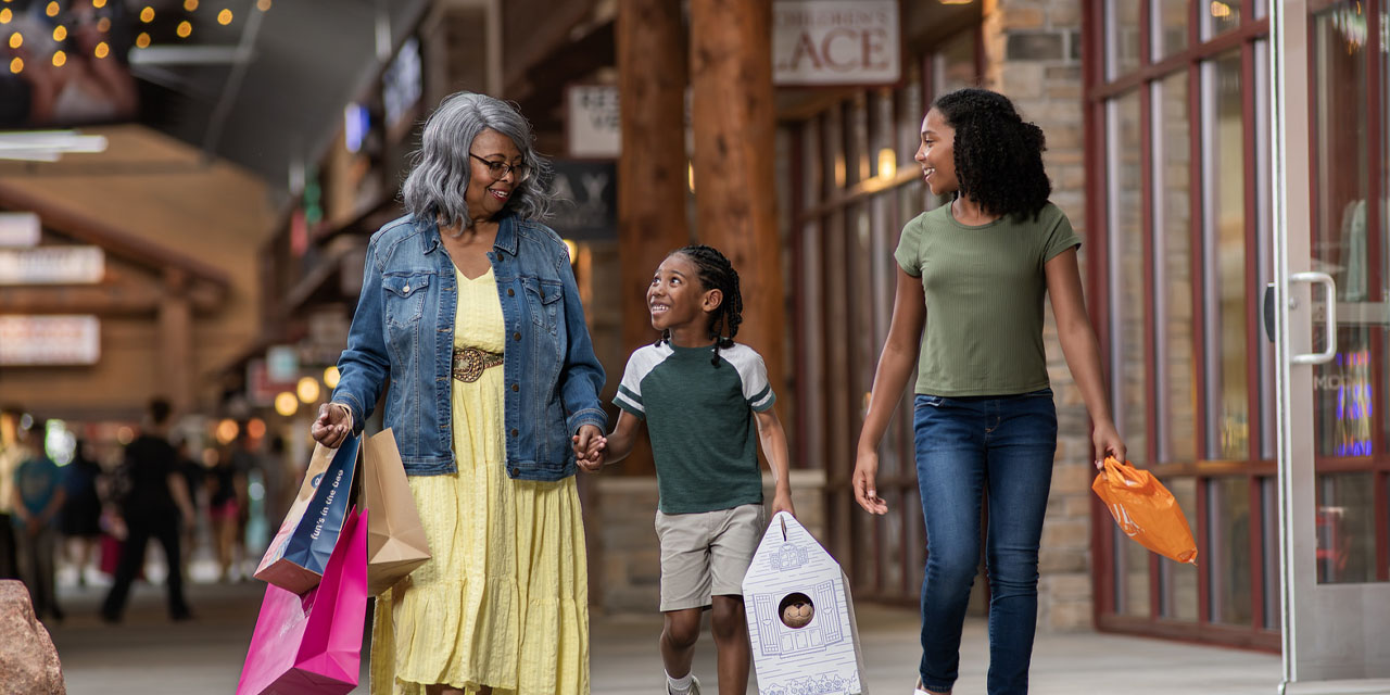 Family shopping at Outlets in the Dells
