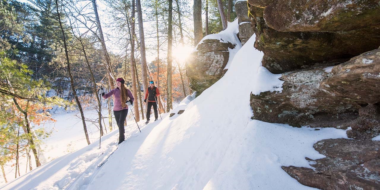 Couple skiing at mirror lake state park