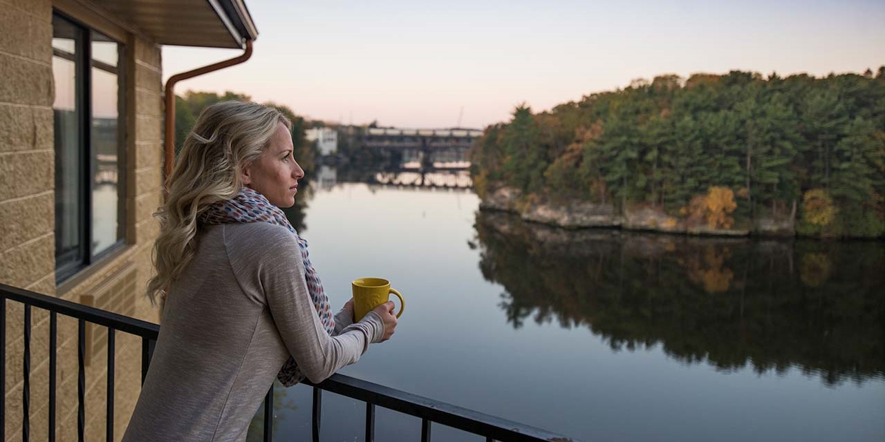 Women looking over the wisconsin river at the VUE boutique hotel