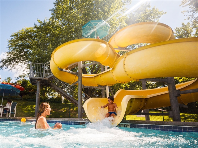 Large yellow waterslide at Yogi Bear Campground.