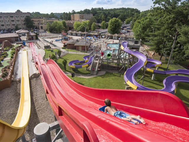 A boy on a racer slide at Chula Vista Resort in Wisconsin Dells.