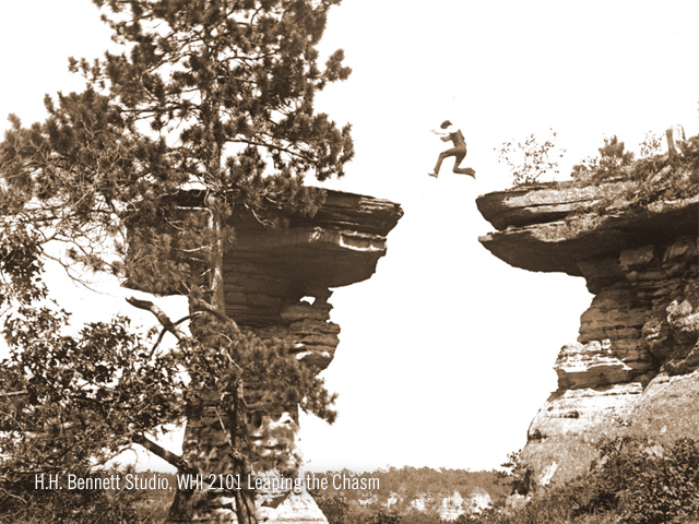 H.H. Bennett's son leaps the famous chasm in Wisconsin Dells.