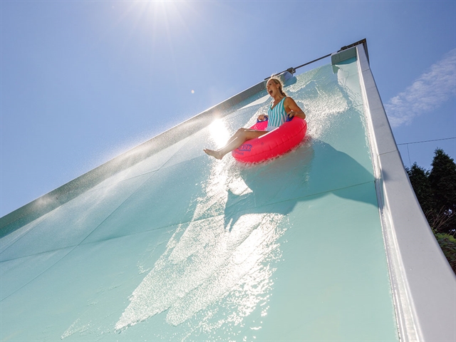 Woman on a tube at Sting Ray waterslide.