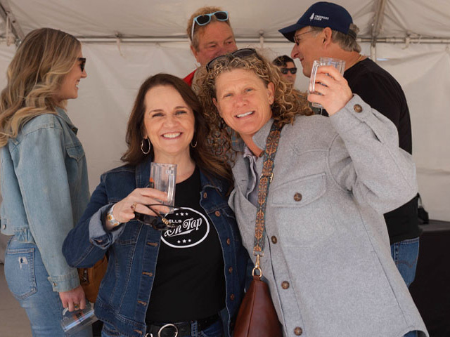 people cheersing at DOT:SSS