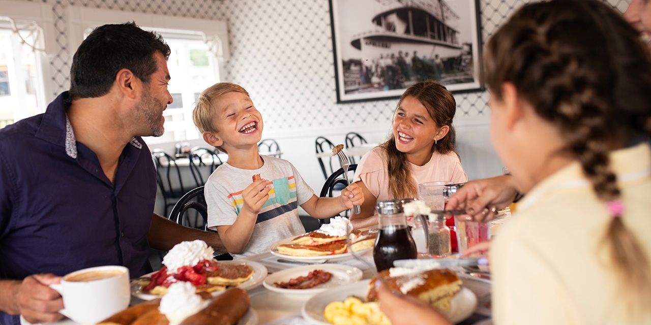 a family eating at Mr. Pancake