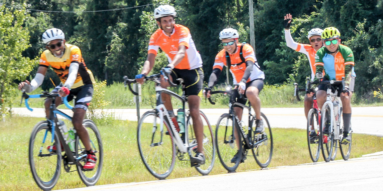 People bicycling.
