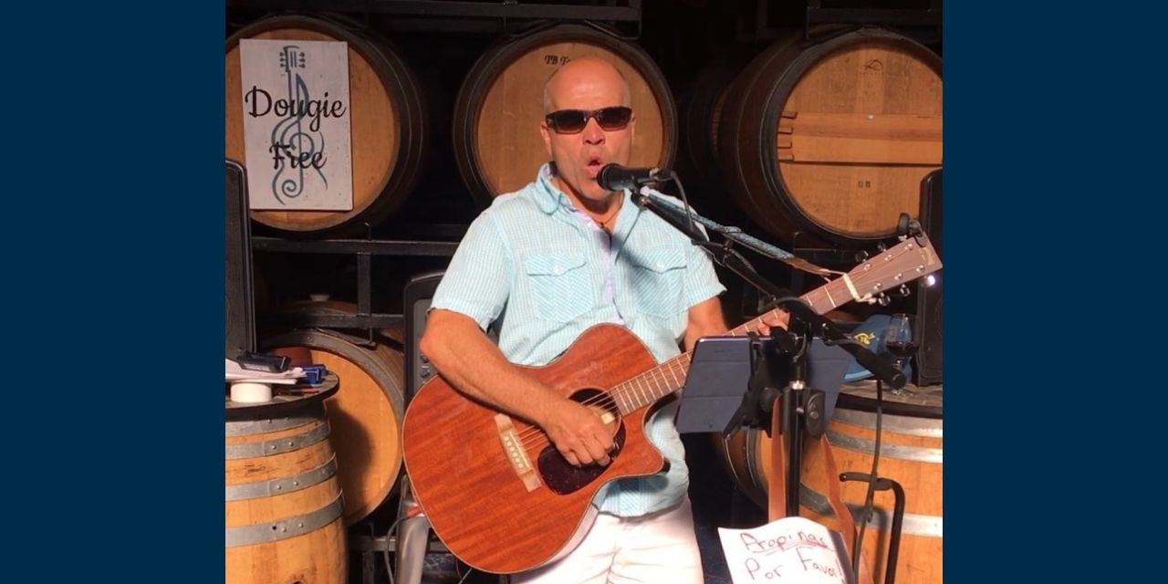 Doug playing guitar