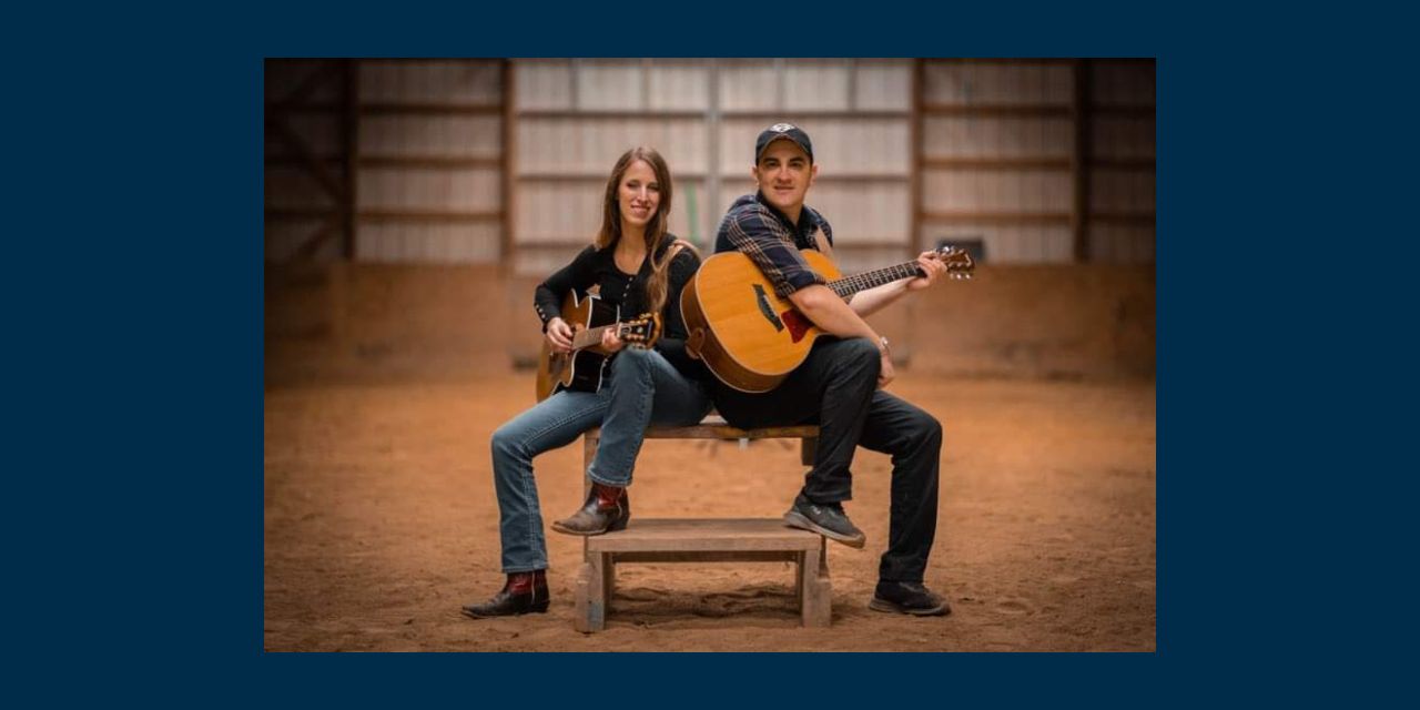 Lindsay and Jon with their guitars