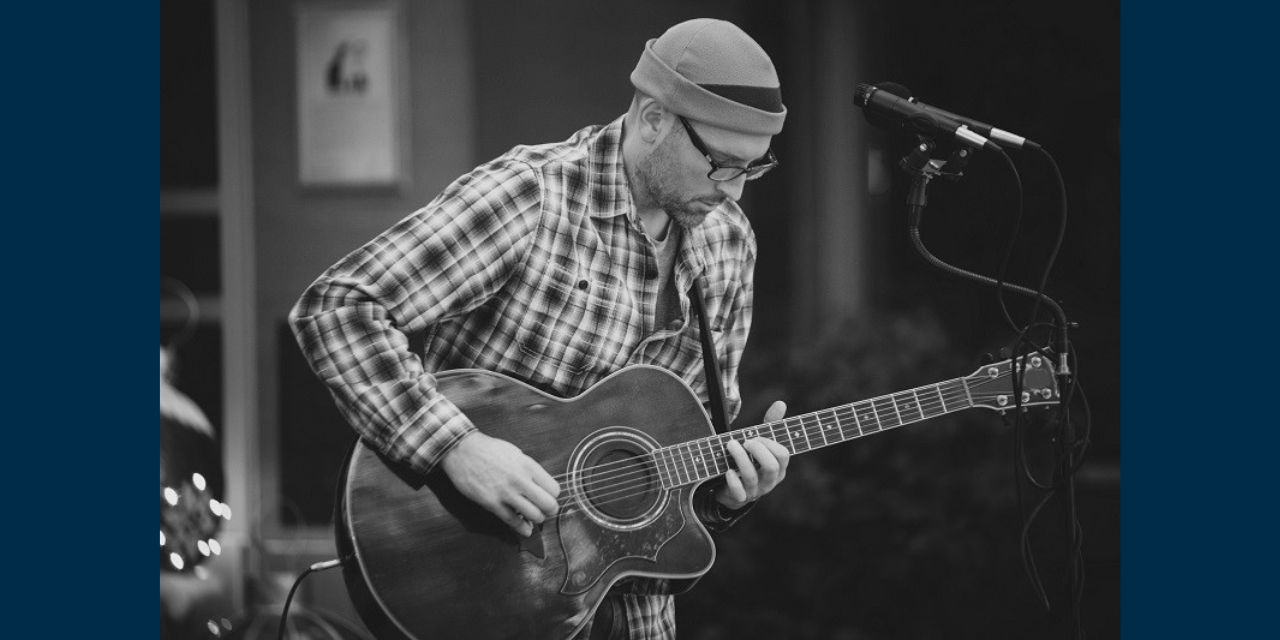 Noah Hittner playing guitar