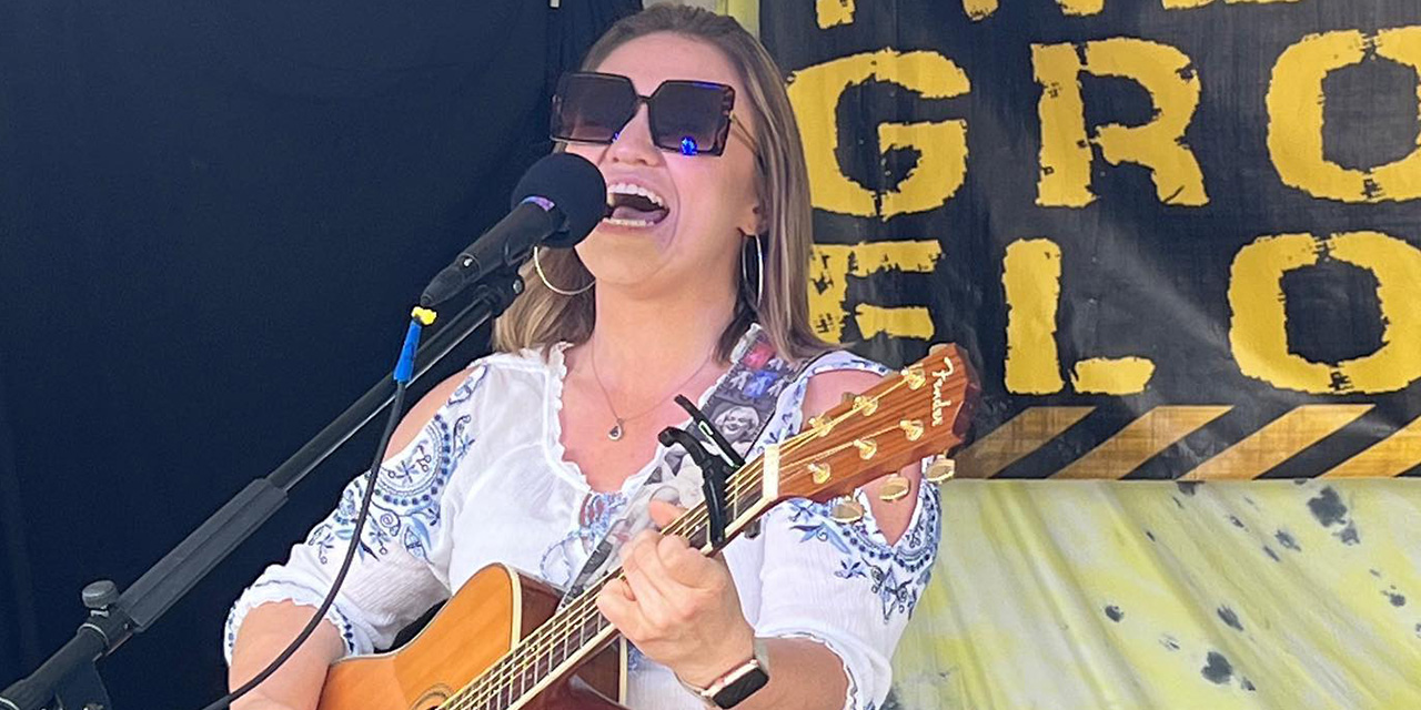 Kylar Kuzio performing live.