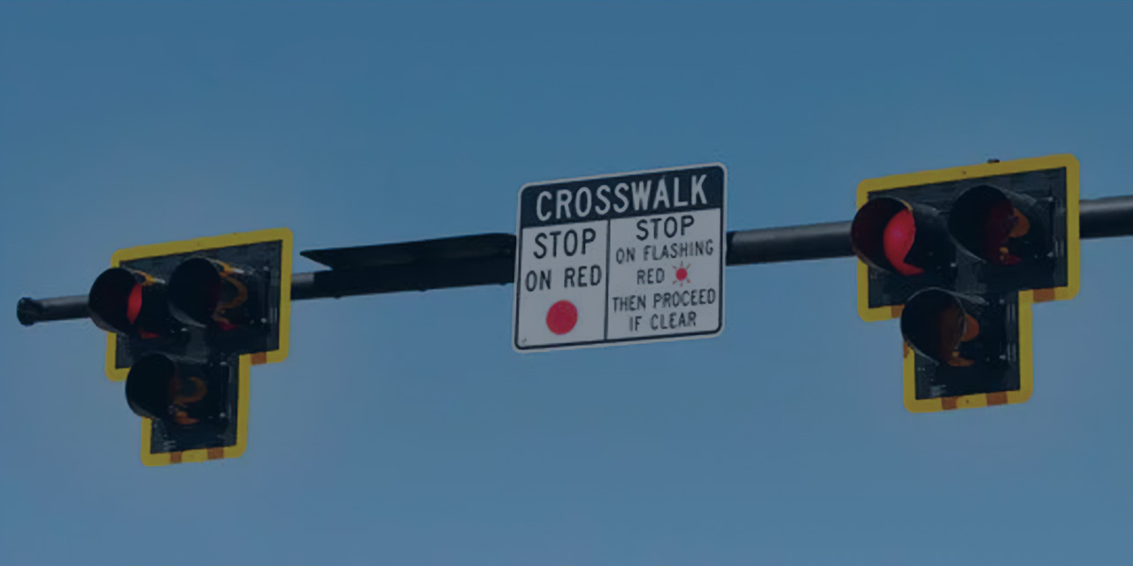 Sign that includes crosswalk information.