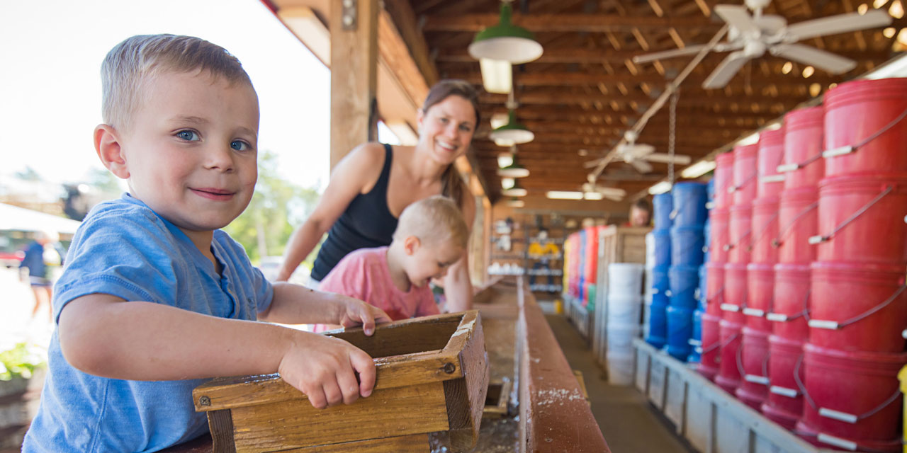 A child pans for gemstones at Dells Mining Co. in Wisconsin Dells.