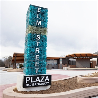 Sign saying Elm Street Plaza and 350 Broadway.