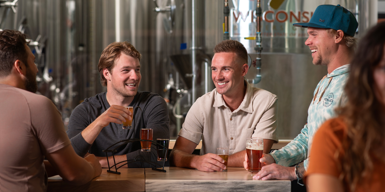 Friends enjoying beer at Bevy's tasting room.