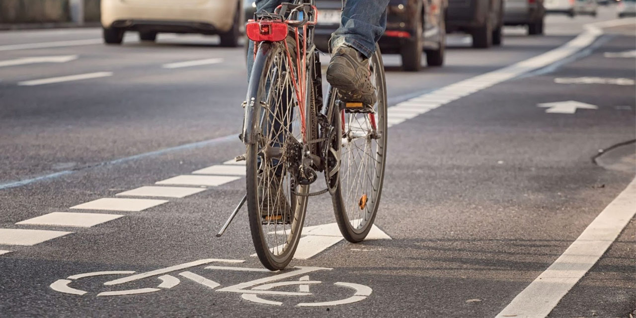 Bicycle rider on the road.