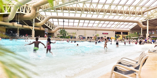 People playing in the wave pool.
