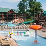 People playing at the outdoor waterpark at Wilderness Resort.