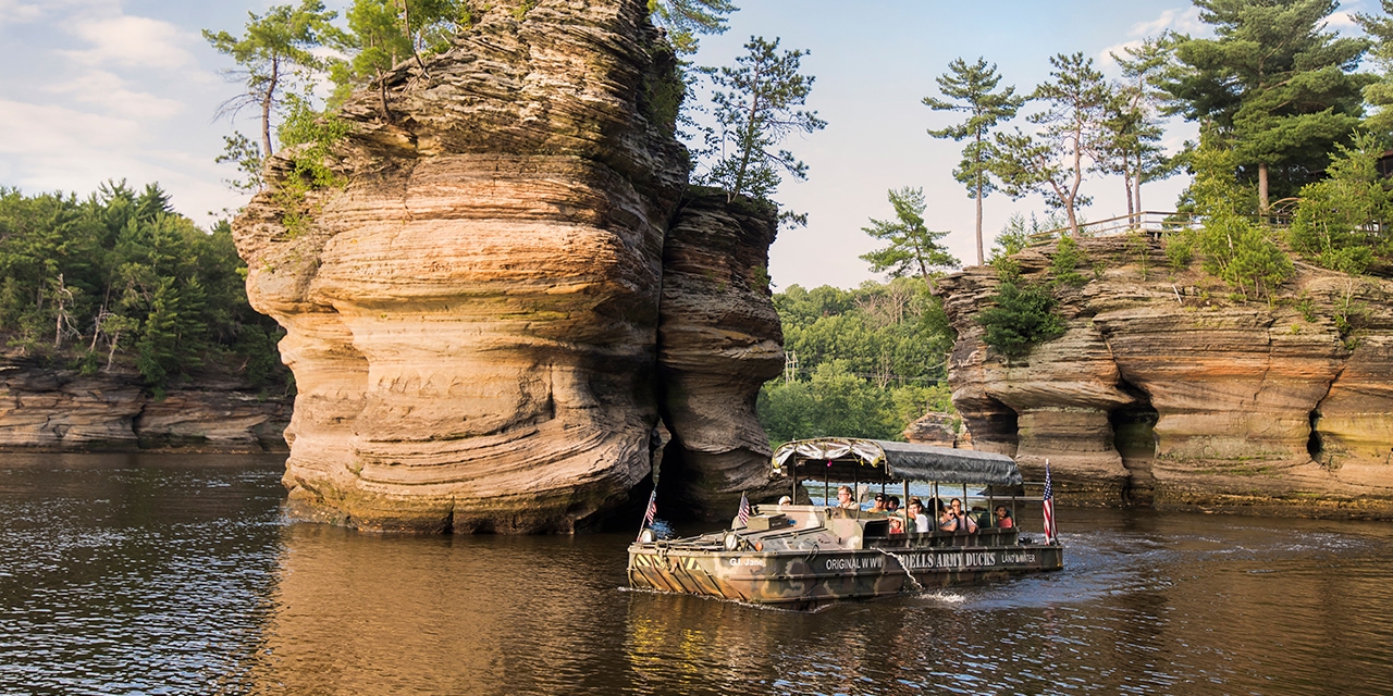 A Dells Army Duck showing visitors the unique rock formations in Wisconsin Dells.