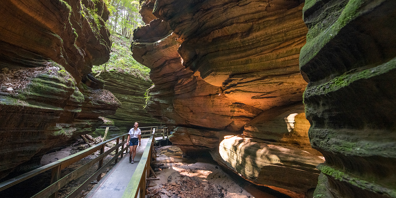 Woman walking through Witches Gulch.