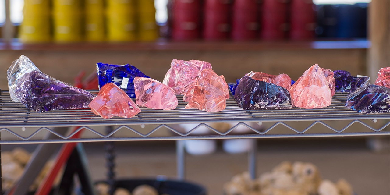 Colorful gems on a shelf.