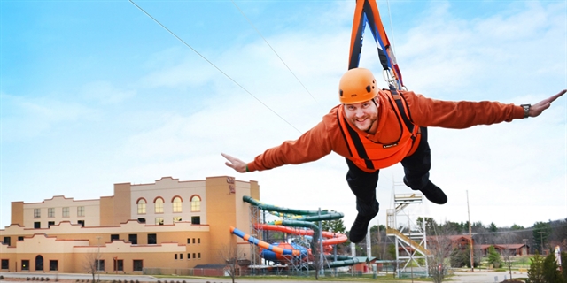 A man on the zipline at Dells Zipline Adventures.