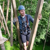 A man on a high ropes course.