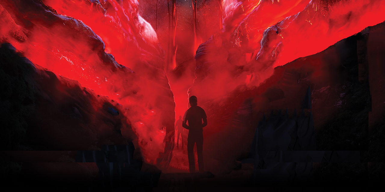 A silhouette of a person in a foggy red canyon.