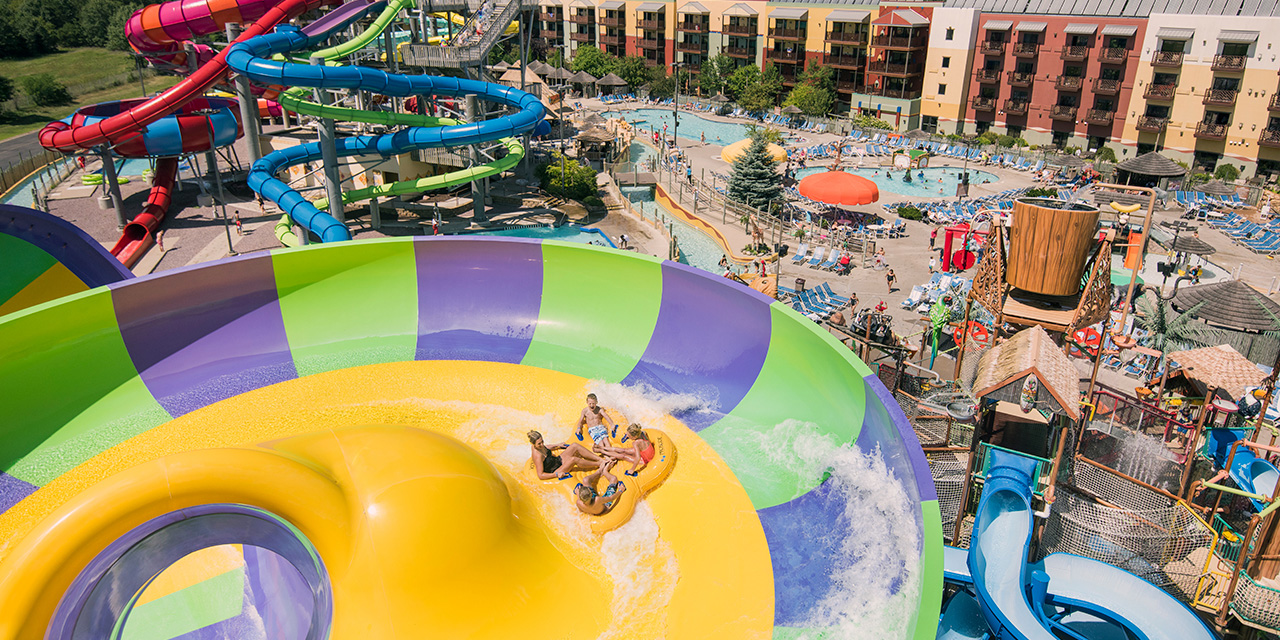 Family on a waterslide at Kalahari Resort.