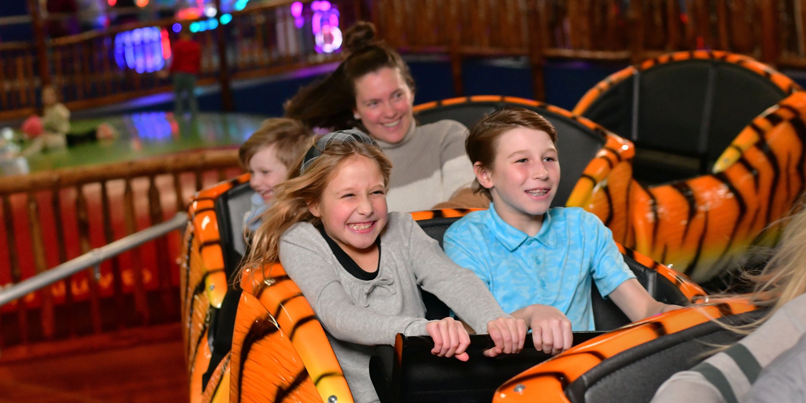 Kids on Knuckleheads tiger roller coaster
