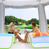 People enjoying the view on a floating cabana.