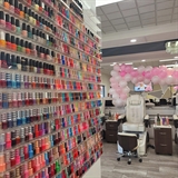 Different shades of nail polish in display.