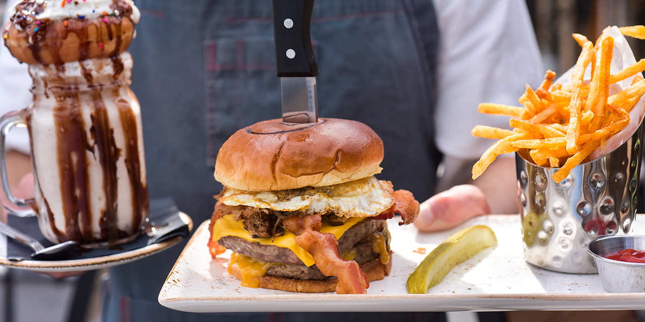 A cheeseburger, shake, and fries at B-LUX Grill & Bar.