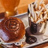 A burger, fries, and drink at B-Lux.