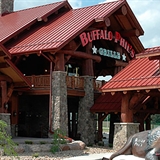 Buffalo Phil&apos;s Pizza & Grille exterior with a buffalo statue.