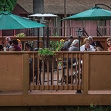 People dining outside at RuBB&apos;s Steakhouse.